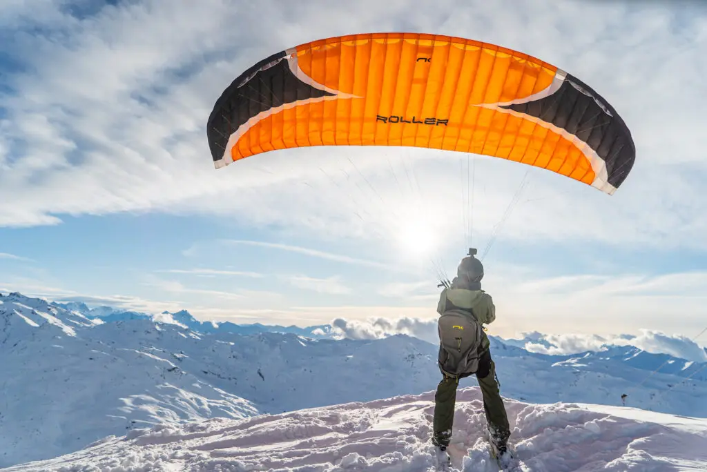 Paragliden tijdens je wintersport in Les Menuires