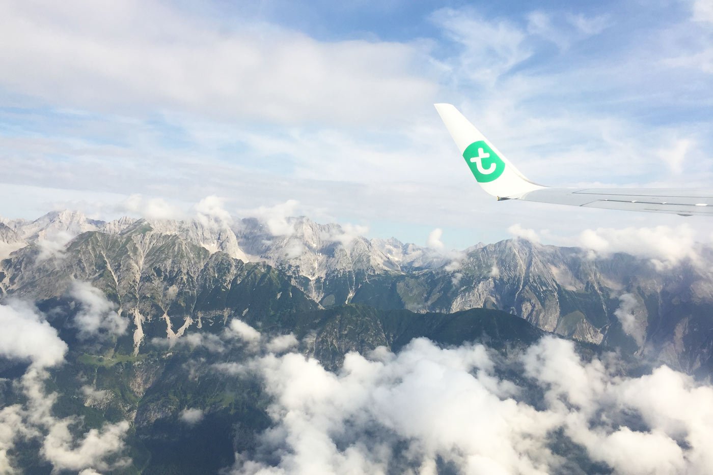 Wintersport vliegtuig oostenrijk vliegen transavia