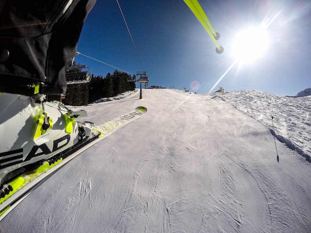 Zon sneeuw skis head