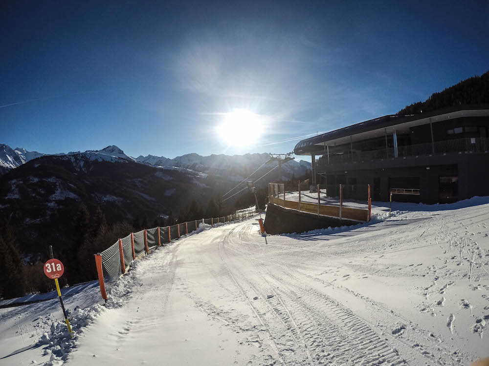 zon sneeuw piste